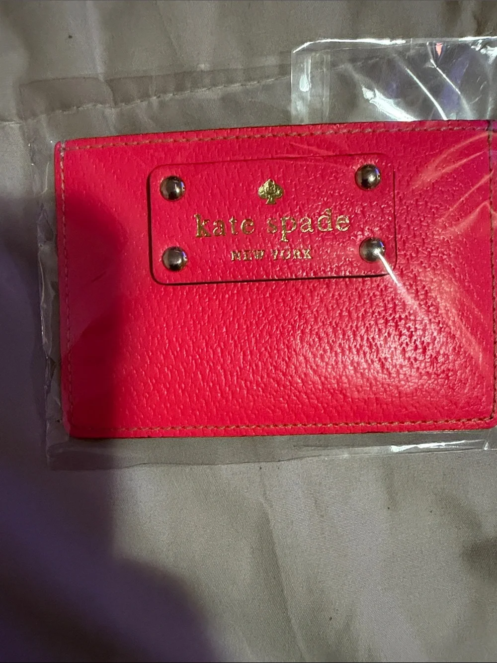 kate spade Hot Pink Leather Card Sleeve with Gold Logo NWOT.
